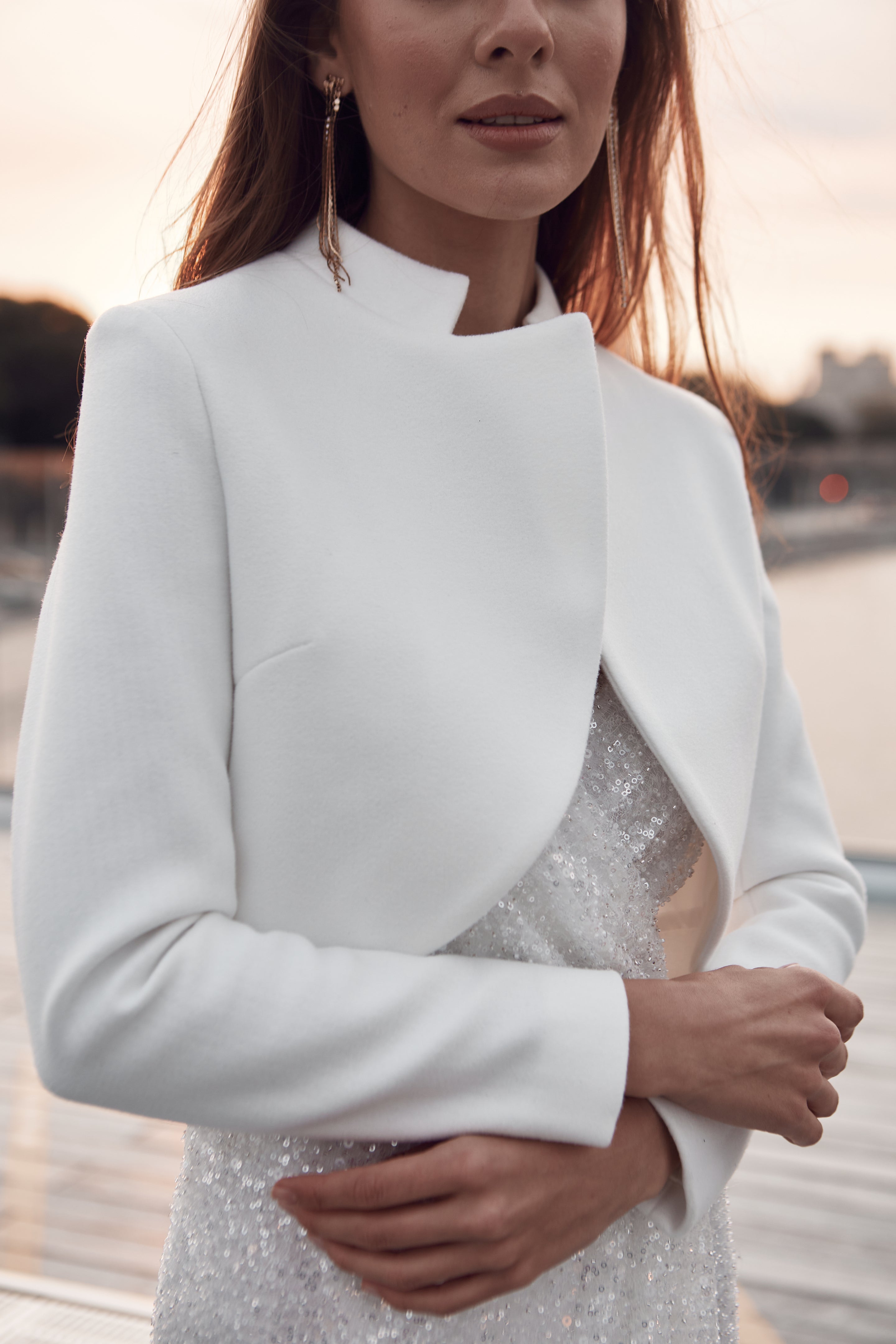 Warm and cozy bridal jacket with collar.