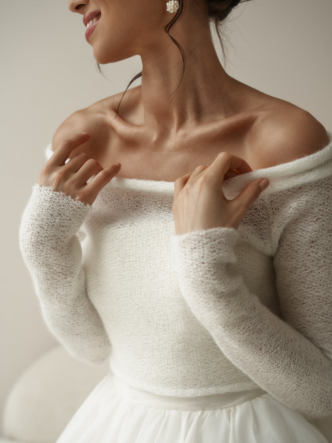 Jersey de novia de punto de lana con espalda abotonada