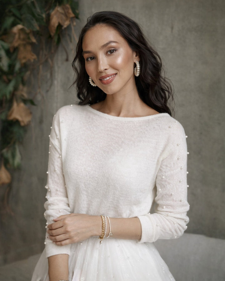 Knitted bridal sweater with beads decoration