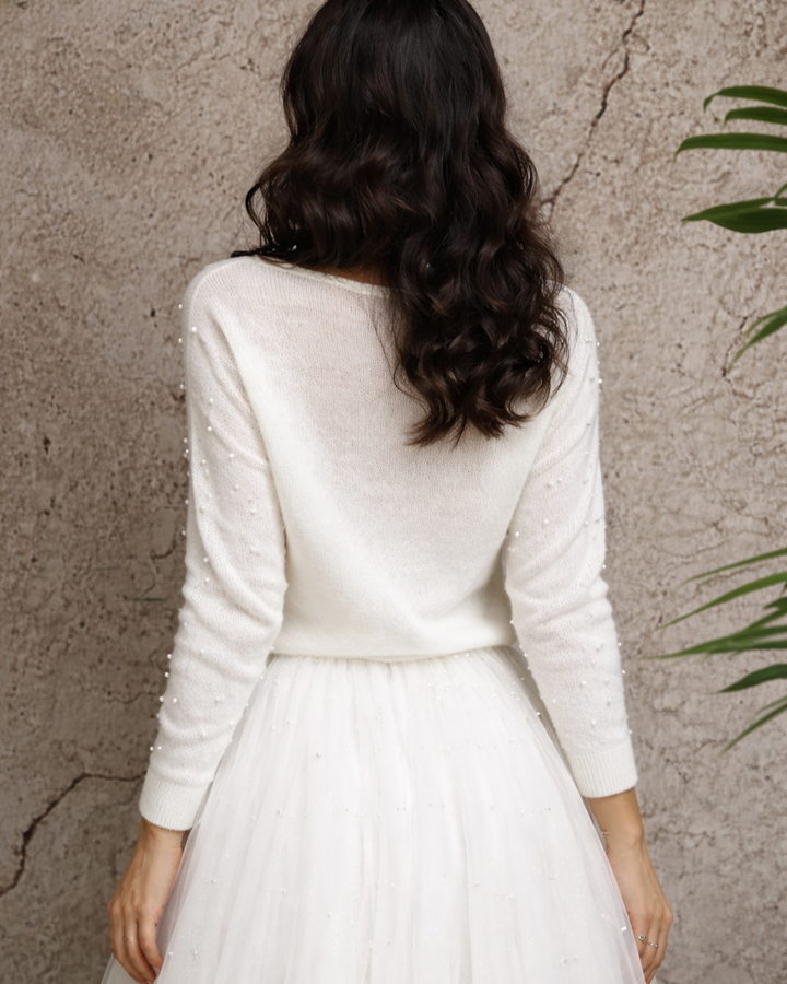 Knitted bridal sweater with beads decoration
