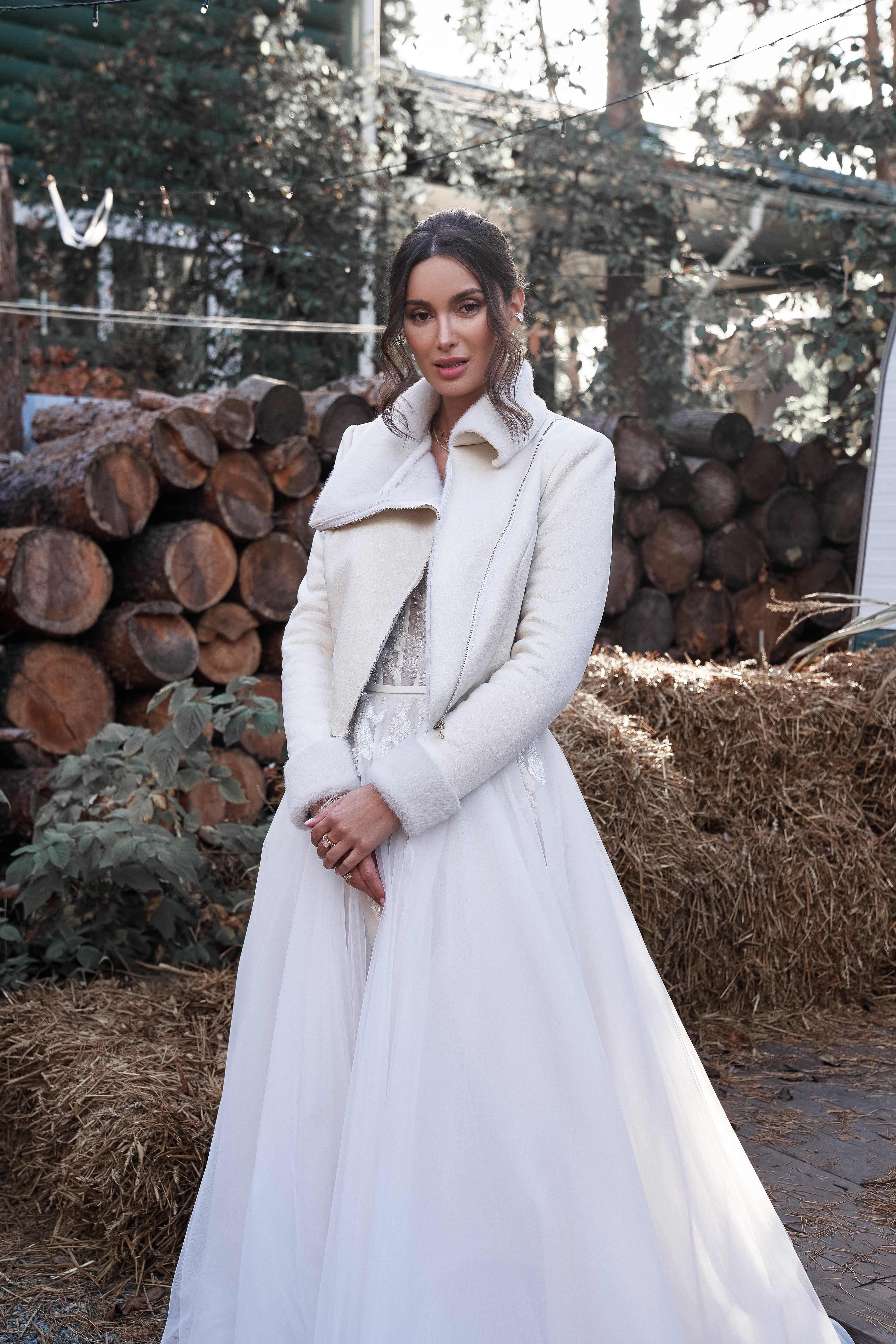 Sheepskin coat for a bride in ivory pearl color.
