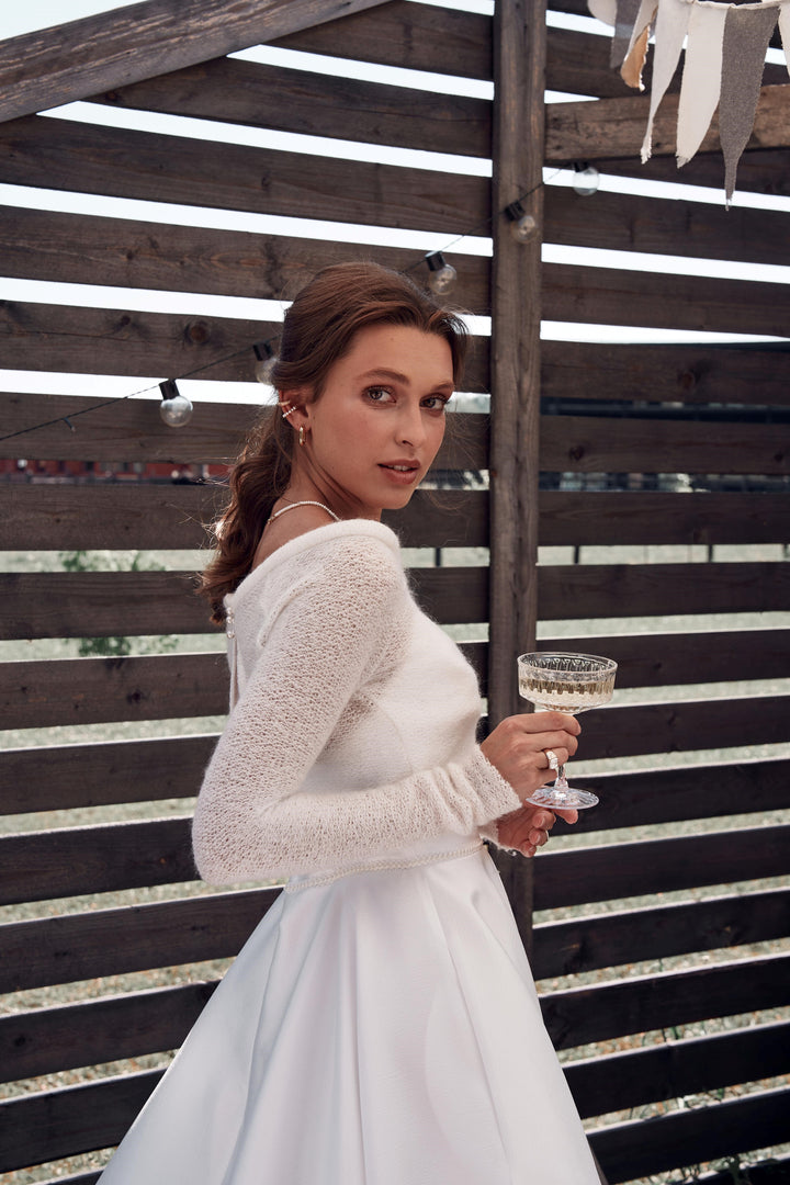 Knitted wool bridal sweater with open back