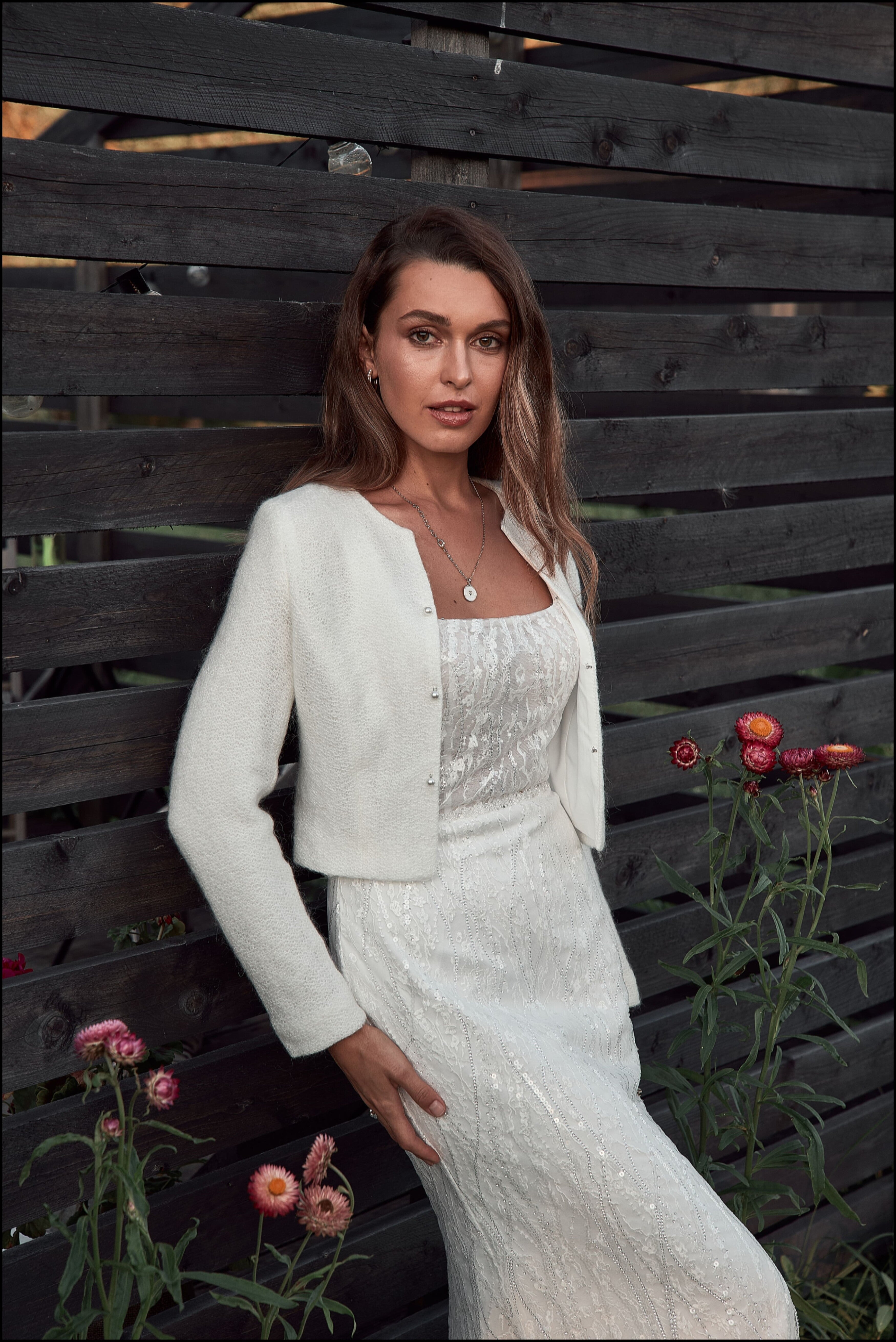 Mohair knitted bridal jacket with pearl buttons.
