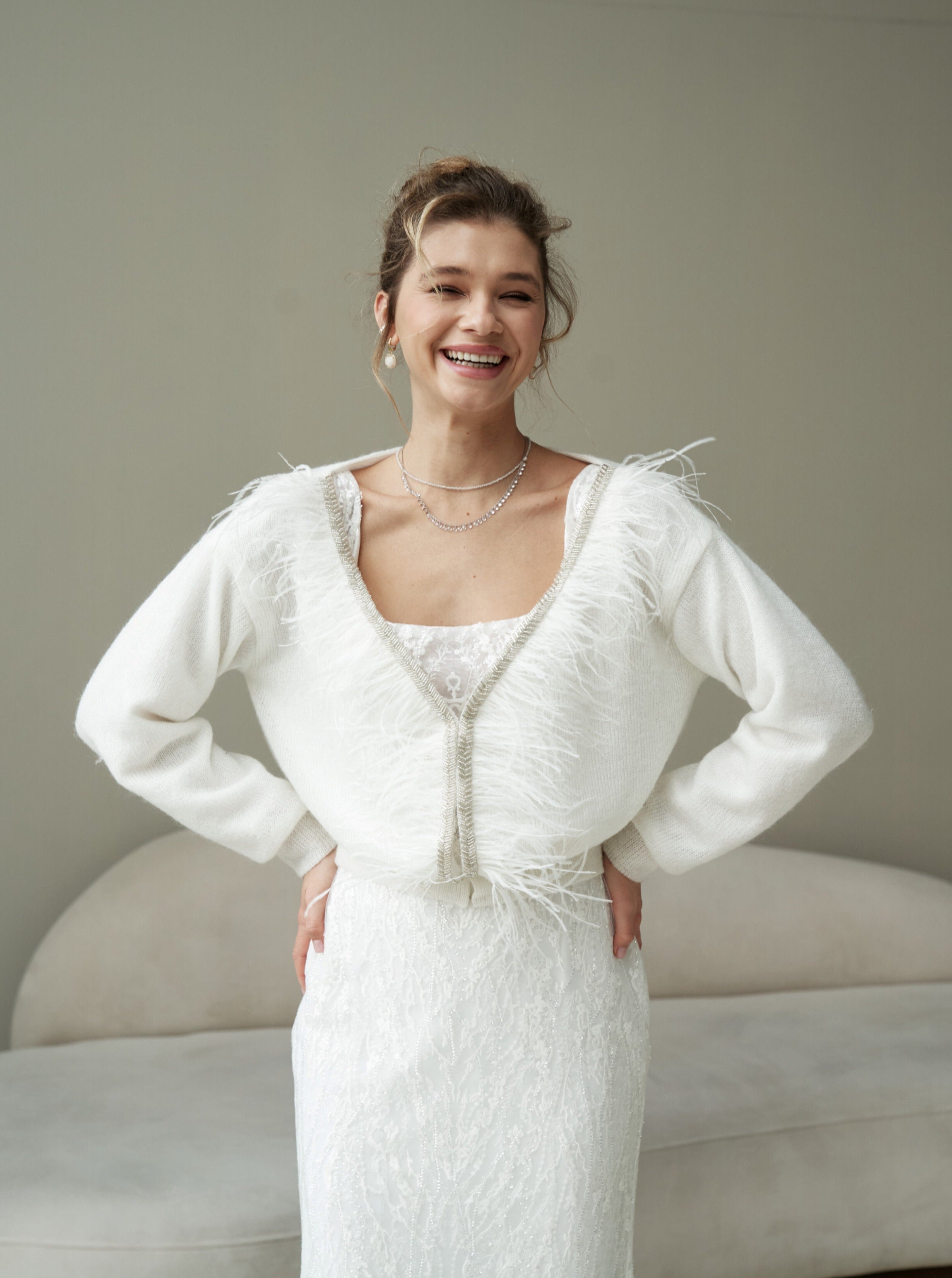 Bridal sweater with feather and handmade embroidery. Wedding cardigan with feathers.