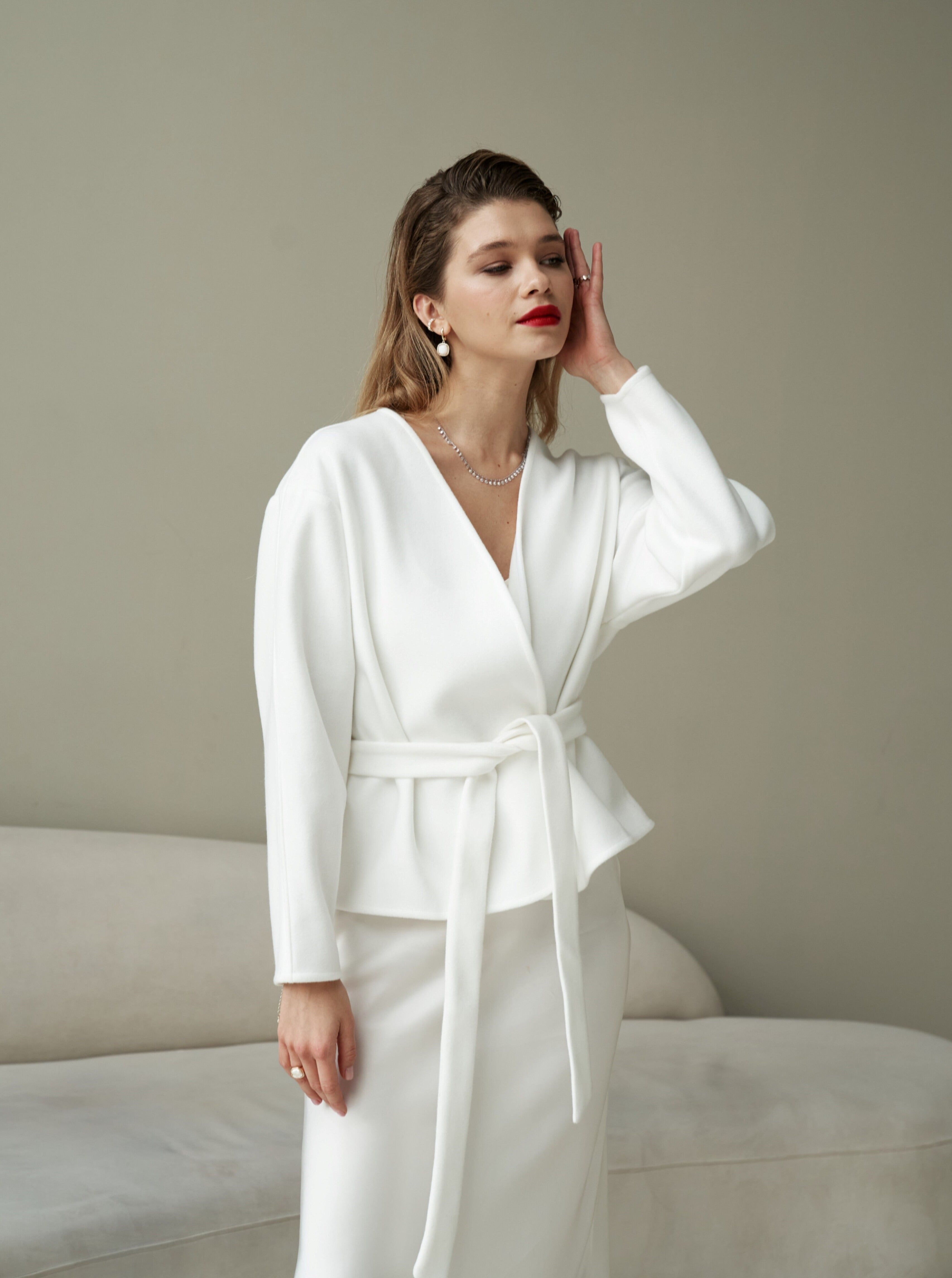 Lightweight bridal coat with belt closure