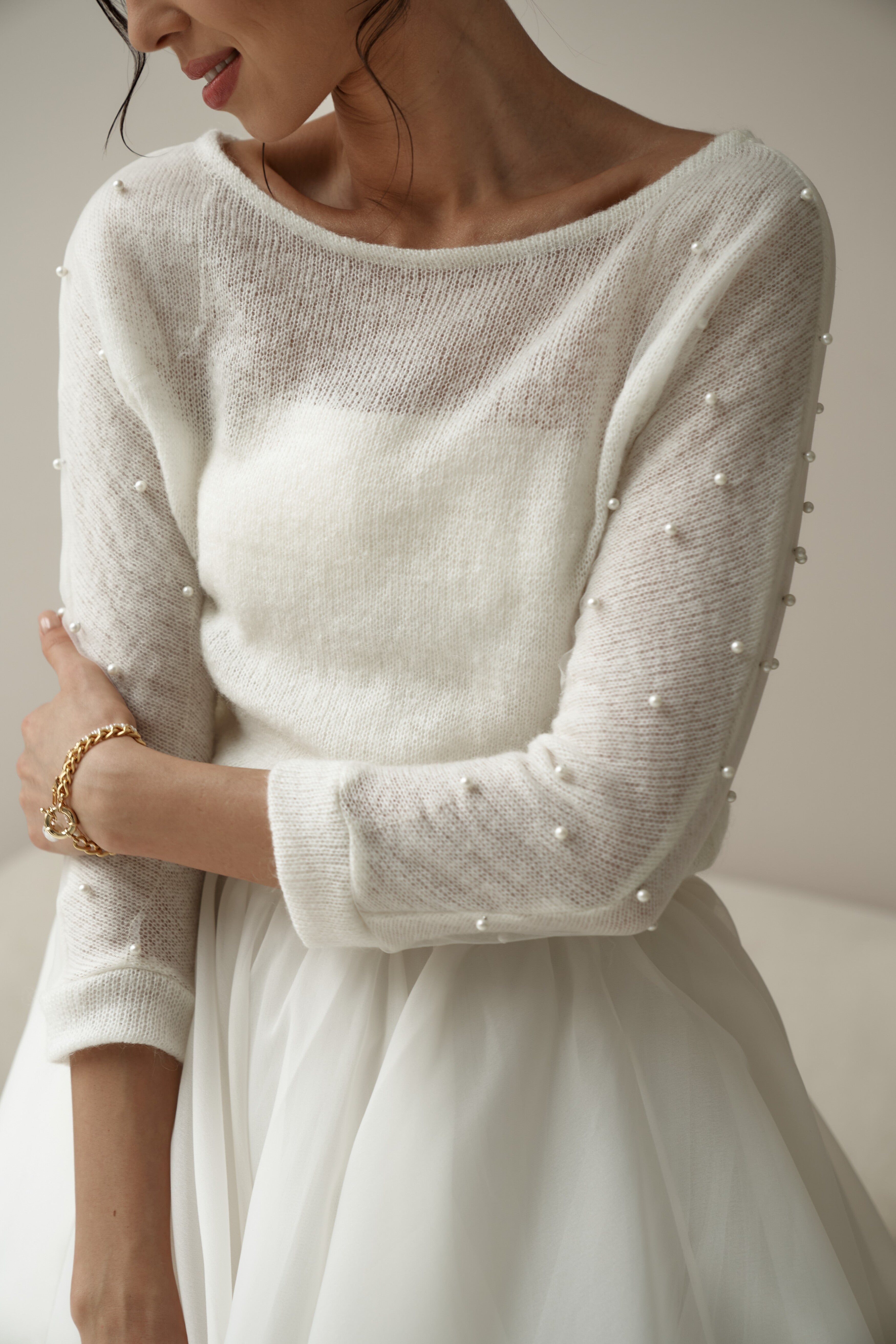Bridal knitted sweater with pearls. Bridal pullover with decorated sleeves.